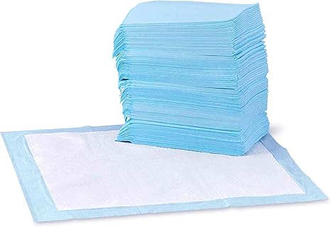 Blue and white pee pad with a stack of 99 other pee pads on top of it
